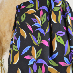 Tissu viscose stretch motif feuillage bleu vert fond noir