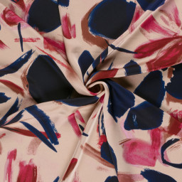 Tissu Satin duchesse motif fleurs bleu marine fond rose clair