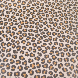 Tissu imperméable type ciré motif léopard fond écru